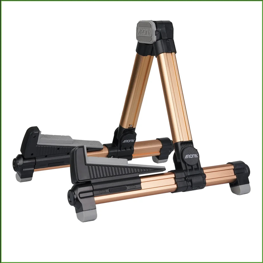 Aromax foldable aluminum guitar stand in gold and black with adjustable legs for stable support of bass ukulele violin