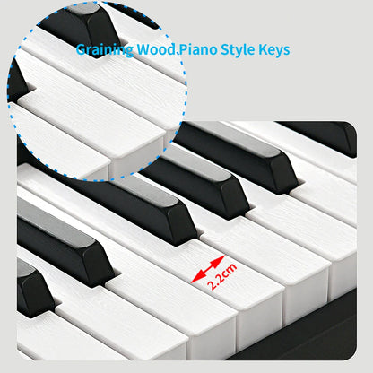 White and black piano-style keys with wood grain finish on foldable musical keyboard professional midi controller