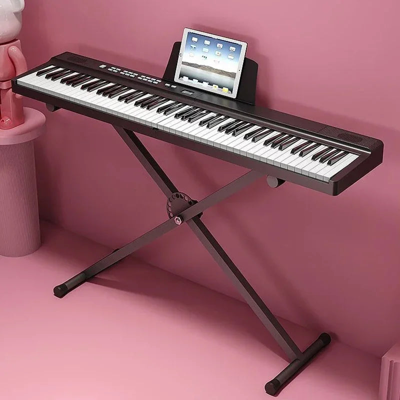 Black foldable piano with 88 white and black keys on a matching x-shaped stand midi bluetooth adult electric organ professional keyboard