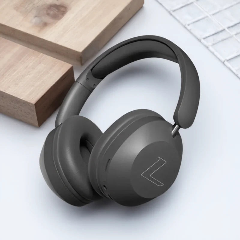 Dark gray foldable wireless bluetooth over ear sports headphones with sleek design and high power stereo sound