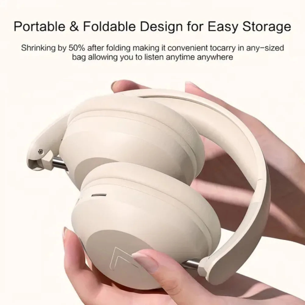 Cream-colored foldable wireless bluetooth over ear sports headphones with sleek metallic accents and high power stereo sound