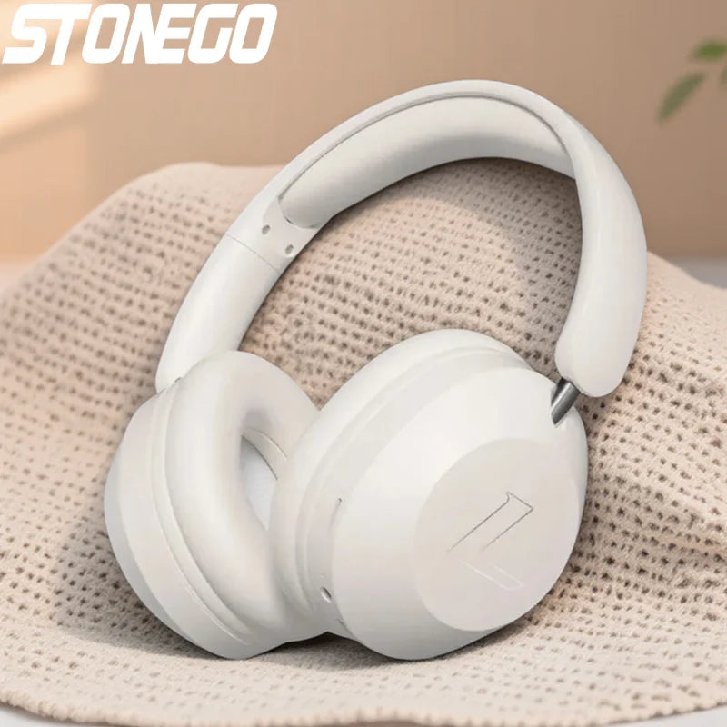 White foldable wireless bluetooth over ear sports headphones with sleek design and soft padding for high power stereo sound
