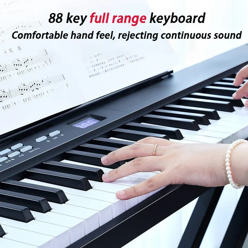 Black and white 88-key folding adult electronic piano with professional midi bluetooth and portable organ design