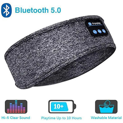 Gray speckled fabric fone bluetooth earphones sports sleeping headband with built-in audio controls and display reading enjoying