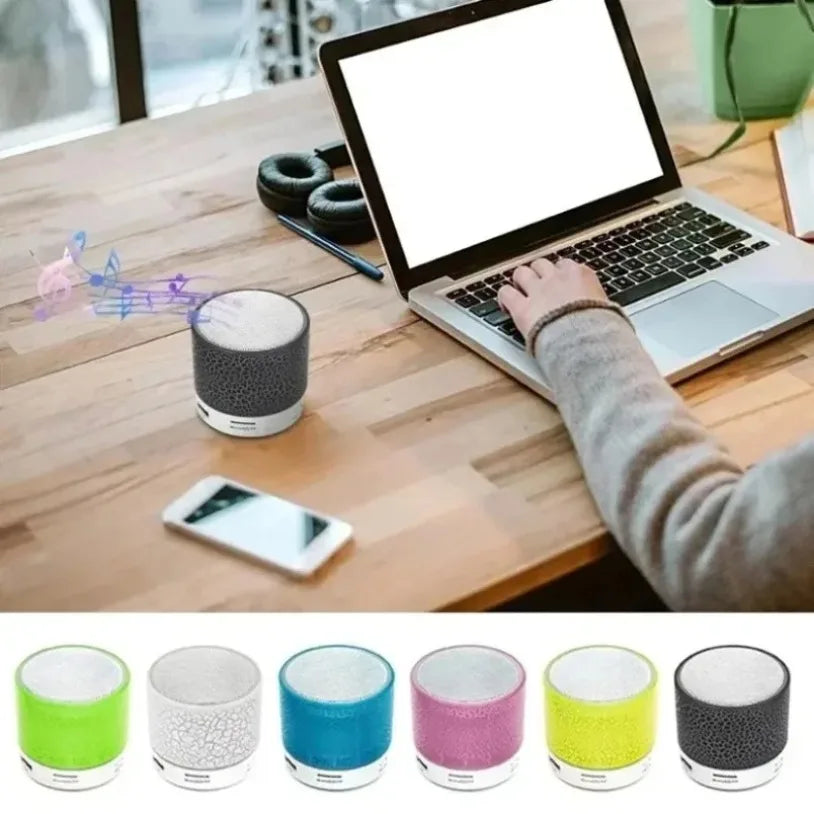 Gray textured cylindrical mini speaker led with white base and glittery finish for car 3d stereo outdoor sound box