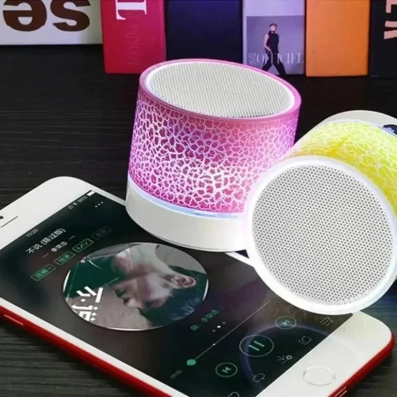 Pink and white patterned cylindrical bluetooth mini speaker led with mesh grille for car 3d stereo and outdoor sound box use