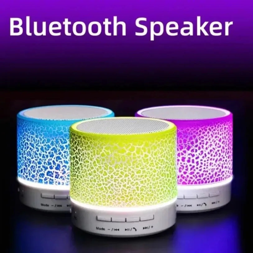 Three colorful cylindrical bluetooth mini speaker led with crackled surfaces and white control bases for car 3d stereo outdoor sound box