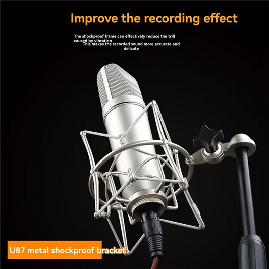 Silver u87 condenser microphone with metallic mesh grille and shockproof metal bracket as noise reduction accessory for studio recording equipment
