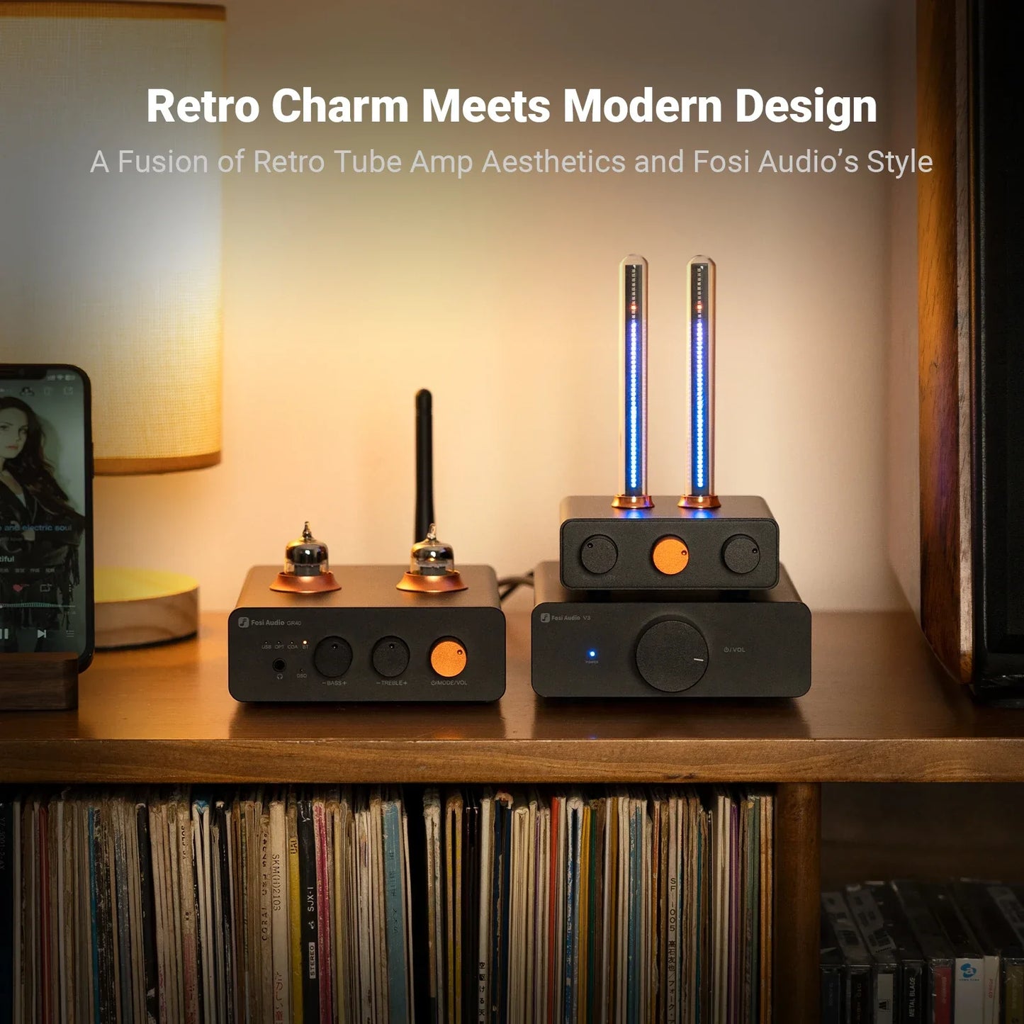 Black fosi audio tube amplifier with orange knobs and glowing blue tubes as rhythm ambient monitor light bar