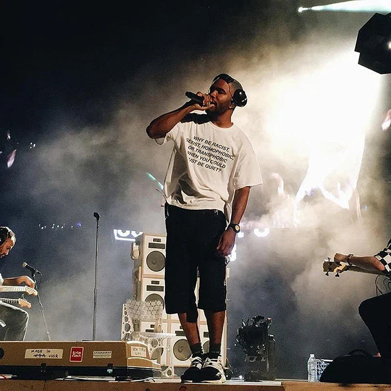 A white frank rapper hip hop tee tshirt womens top with black text made of blond cotton men material worn on stage