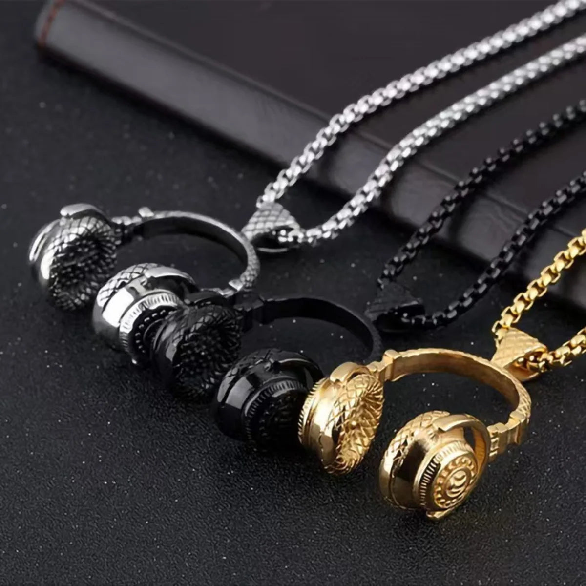 Gold-colored fan dj music headphone pendant necklace with intricate engravings and matching chain hip hop jewelry gift