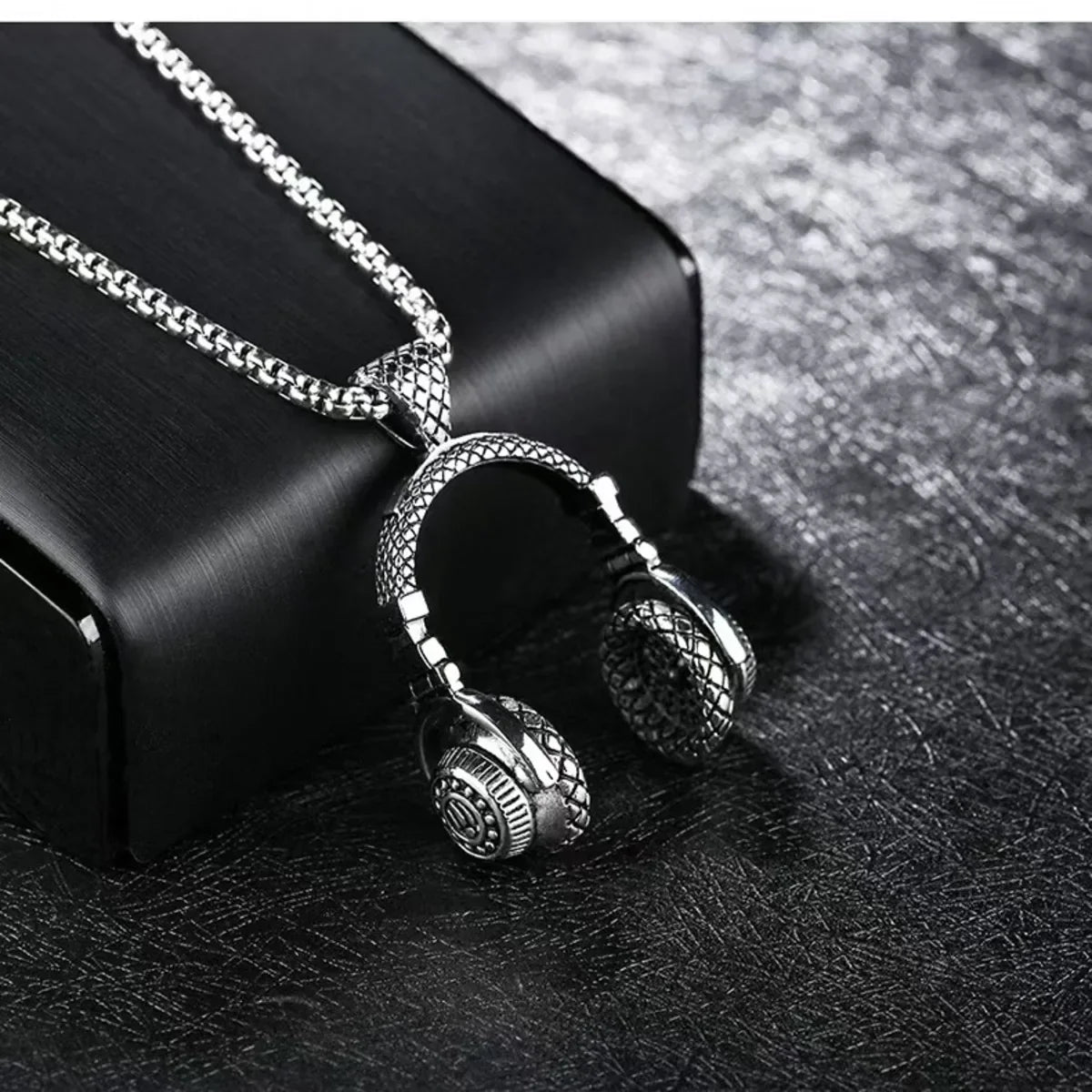 Silver-toned music headphone pendant necklace with intricate mesh and engraved detailing hip hop jewelry gift
