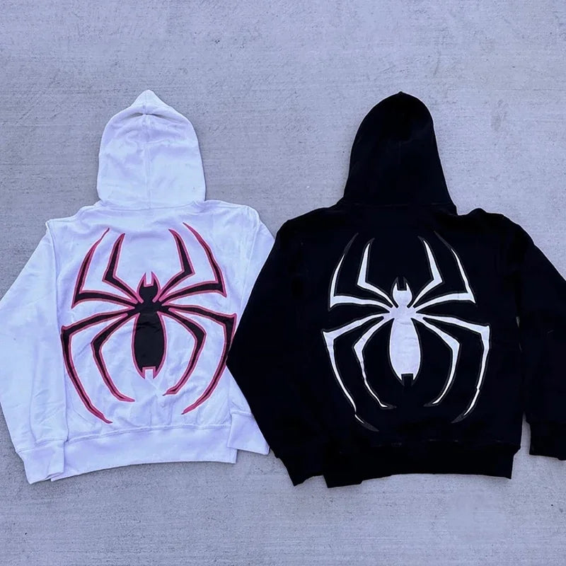 Two full zip up spider hoodies in white and black with pink and white spider designs oversized jacket hood punk gothic y2k streetwear harajuku graphic