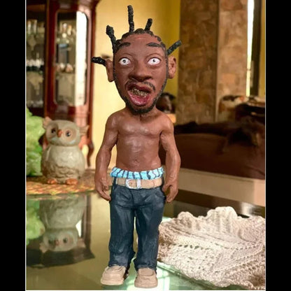 A detailed dark-skinned resin statue of a hop rapper funny bro with dreadlock hair wearing blue jeans and matching shoes