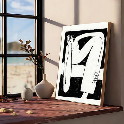 A minimalist black and white modern graphic poster with a stylized human figure framed in light wood for wall art