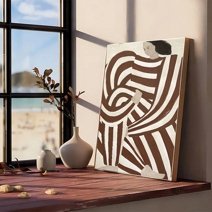 A modern graphic abstract canvas painting with flowing brown and white stripes framed in simple wood