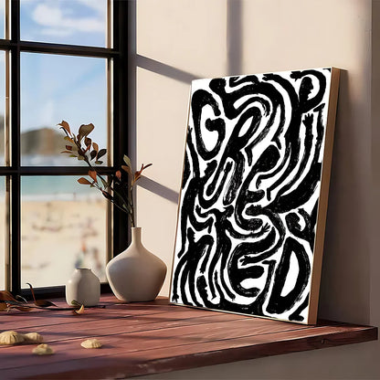 Black and white abstract modern graphic canvas art with bold swirling lettering on kraft club bar paper for wall decor