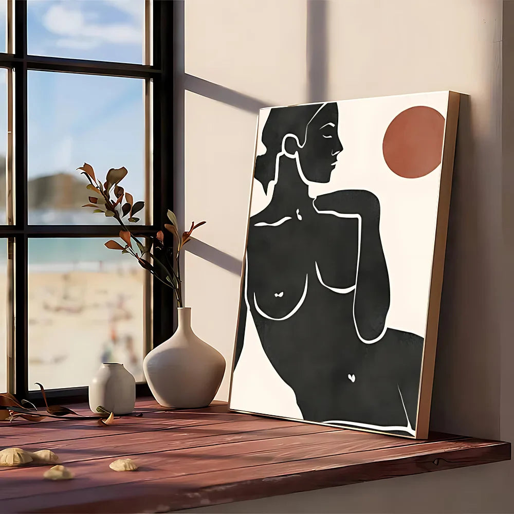 Minimalist black and white modern graphic canvas print with terracotta circle and light wood frame for wall art