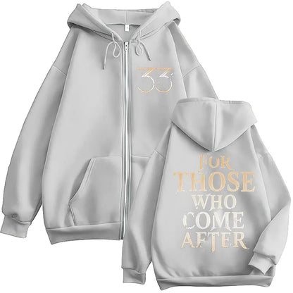 Light gray game esquie clair jacket hoody unisex featuring metallic gold 33 logo and high quality fleece sweatshirt design