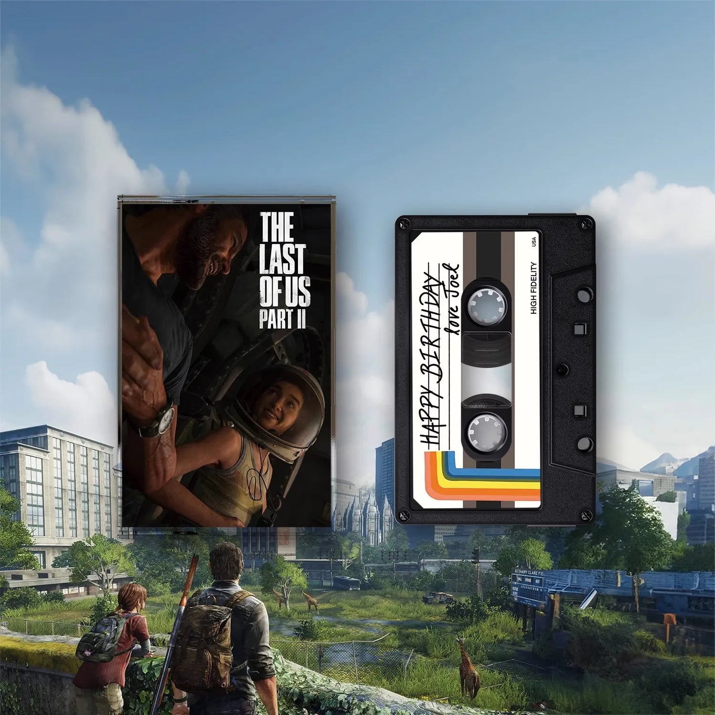 Black cassette tape with white label featuring rainbow stripes and happy birthday love joe text for adam young music recorder soundtracks box