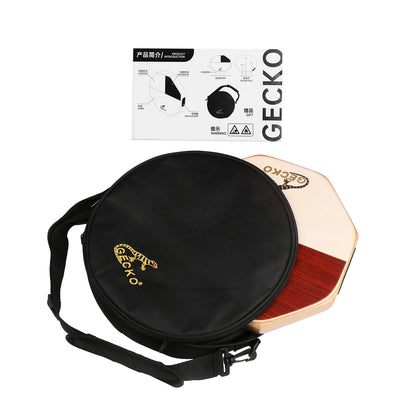 Black circular carrying case with gold gecko logo and adjustable strap for gecko tiger maple wood cajon drum percussion instrument