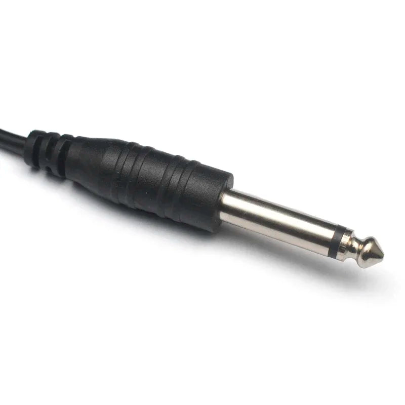 Black plastic-coated guitar pickup piezo audio jack with metallic silver tip for piezo contact microphone use