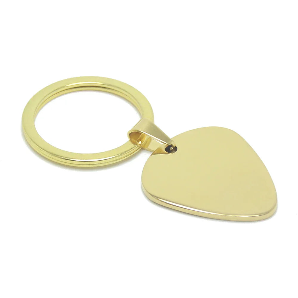 Gold-colored electric bass guitar pick keyring with polished metallic finish musical instrument accessories