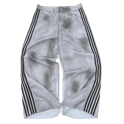Silver-gray distressed denim pants with three bold black stripes down each leg in a gothic punk y2k hoodie two piece set