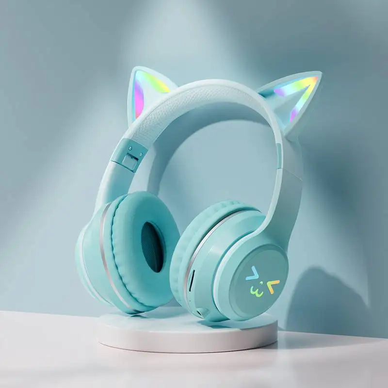 Pastel blue cute cat ear bluetooth-compatible wireless headphones with glowing rgb accents and microphone for girls and kids