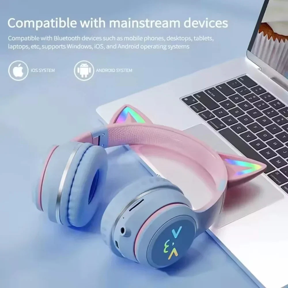 Pastel blue and pink gradient wireless headphones with iridescent cat ear bluetooth and microphone stereo music features