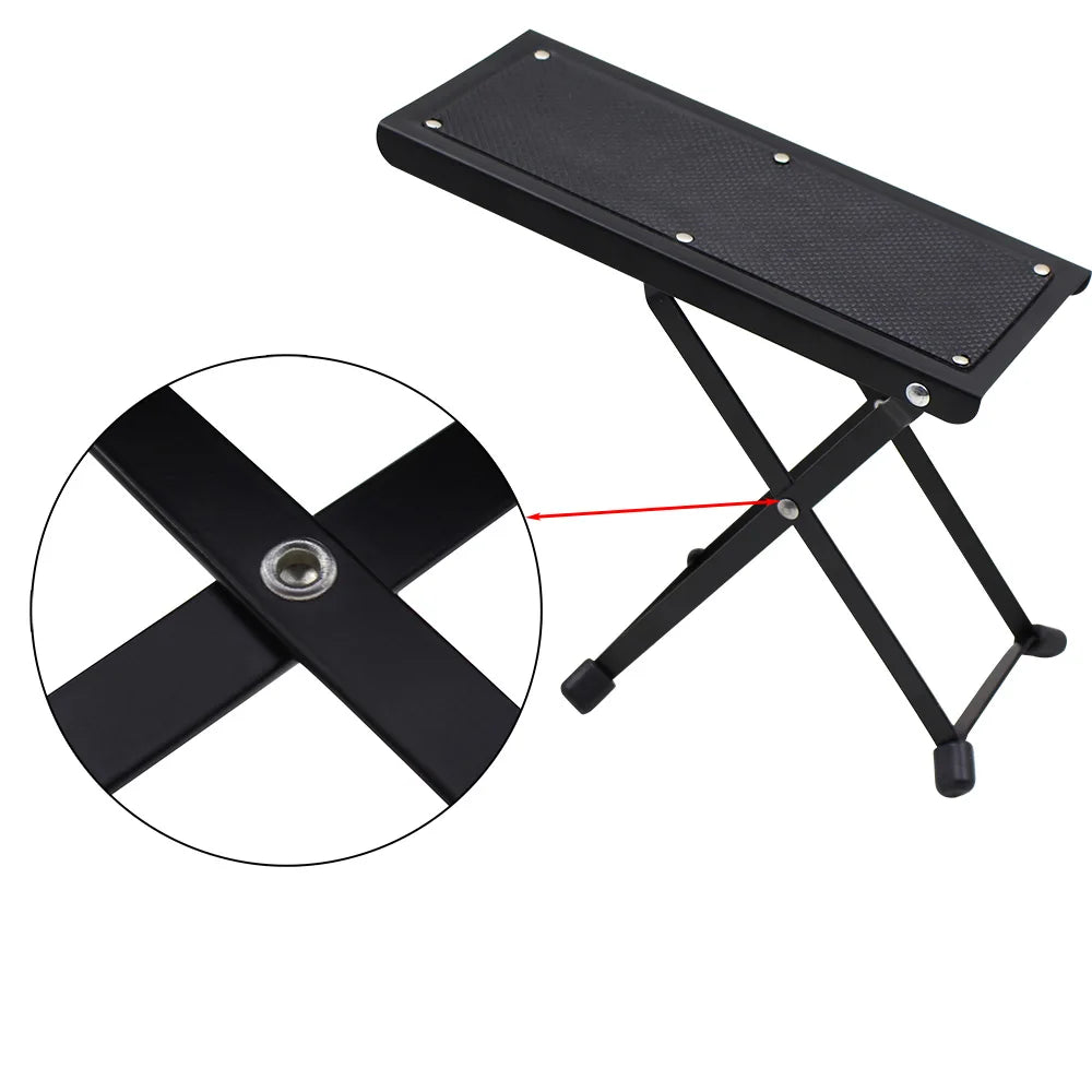 Black foldable guitar pedal foot stool with textured footrest and metal frame for adjustable height pedal foot rest use