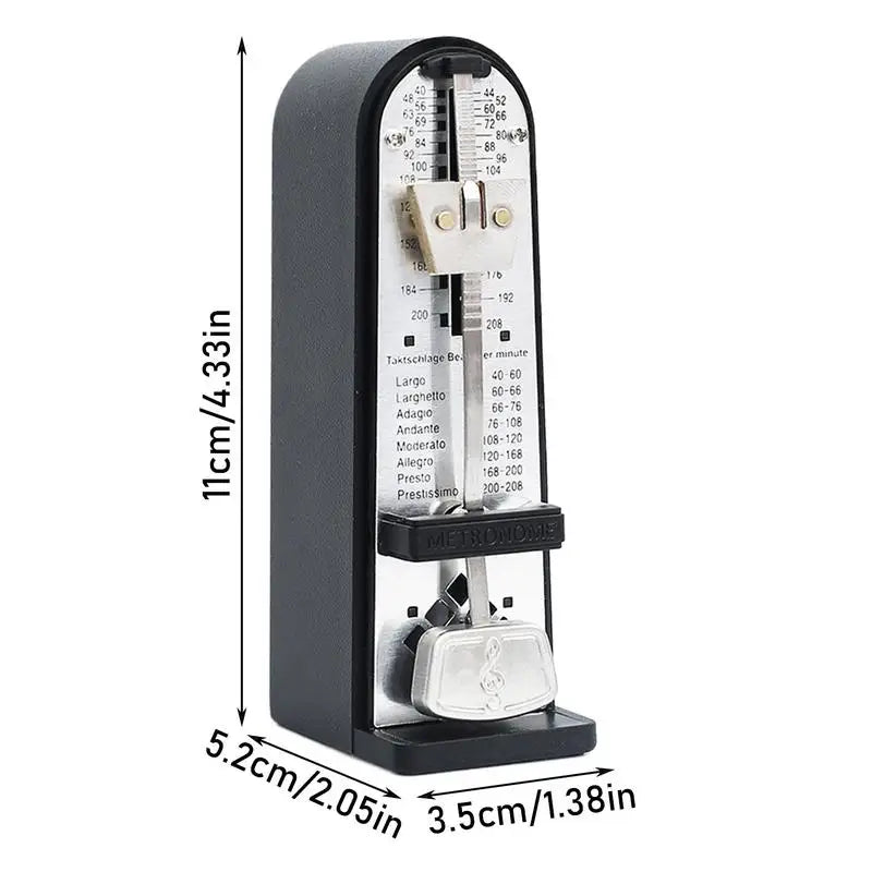 Black mechanical metronome with silver accents and clear glass front piano metronome adjustable for practicing performing musical use