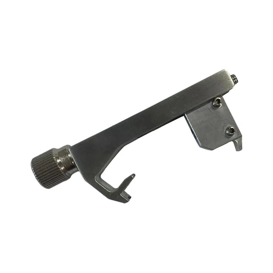 Silver-toned metal guitar tone calibrator with knurled adjustment knob and precision clamp for professional guitar accessory use