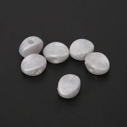 White oval pearl beads with smooth surface and central holes for threading in 6pcs tuning peg machine heads knob set
