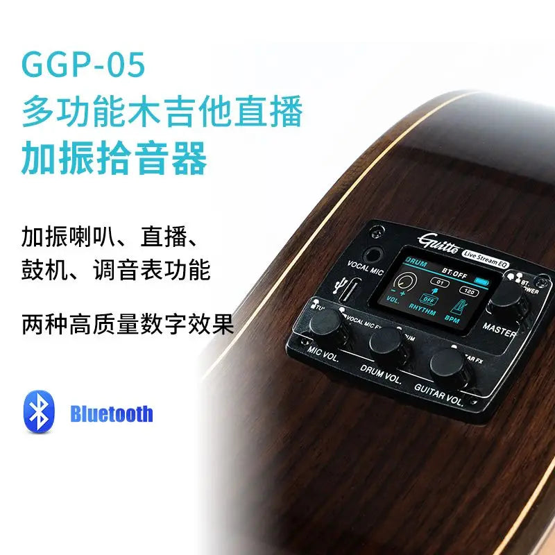 Black guitte live-streamed pickup system with digital display and control knobs mounted on acoustic guitar body