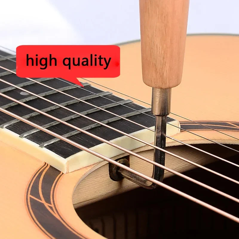 A wooden-handled guitar wrench hexagon adjusting rod solid metal tip on acoustic guitar fingerboard pitch tool
