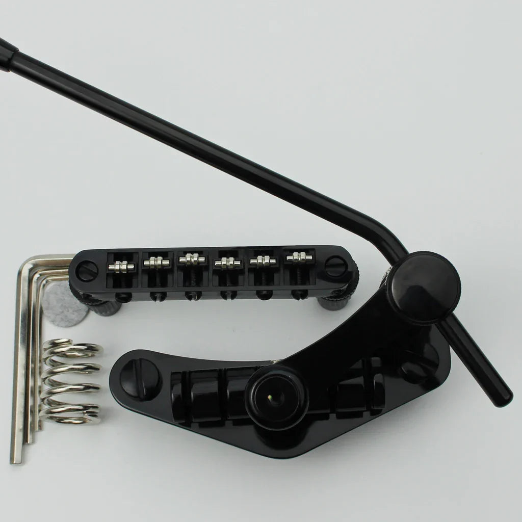 Black guyker tune-o-matic roller saddle guitar bridge with silver tuning pegs and stop bar tailpiece tremolo parts