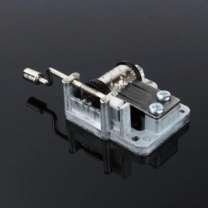 Silver-toned hand crank music box with visible diy craft mechanism and box musical movement for girls with screws