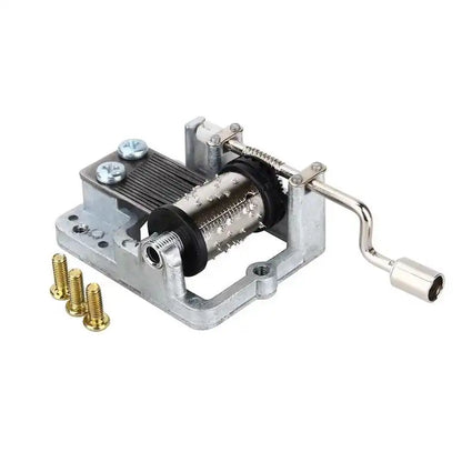 Silver-toned hand crank music box with visible box musical movement and three brass screws for diy craft mechanism