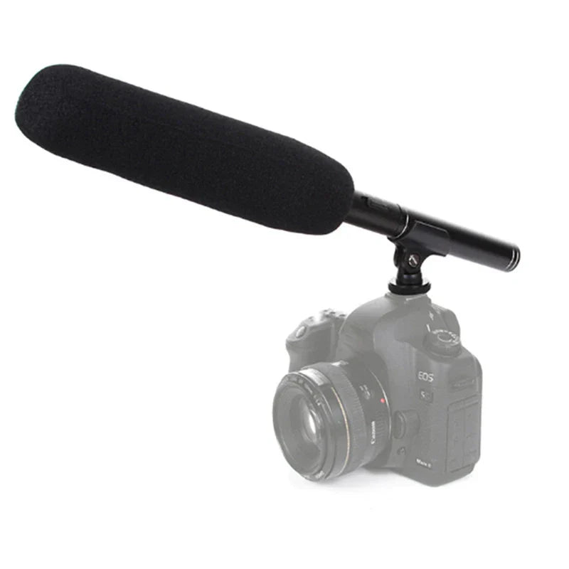 Black foam-covered handheld interview microphone cardioid condenser shotgun microphones mounted on dslr camera