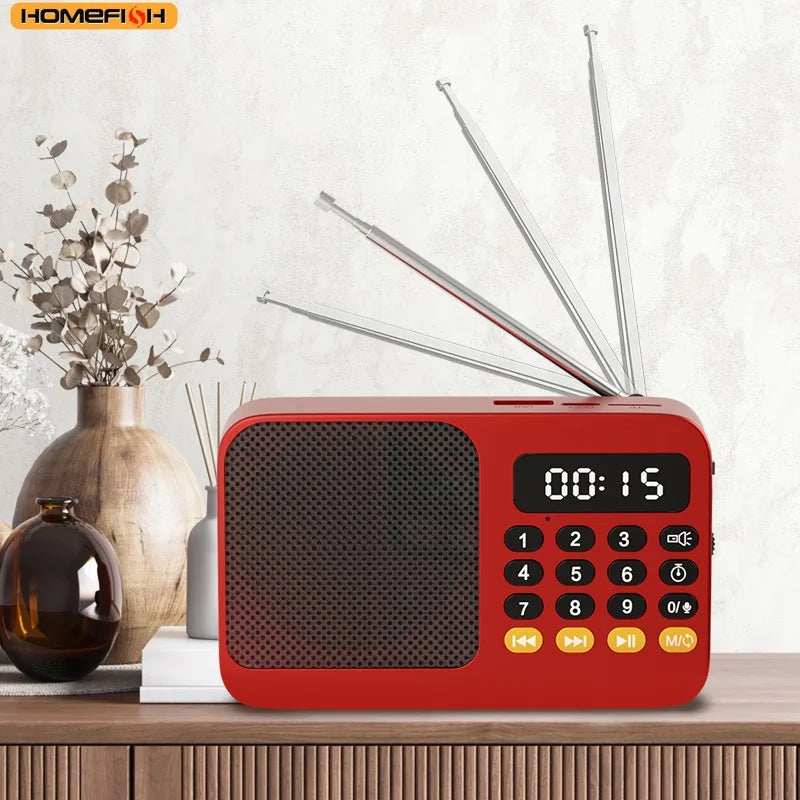 Red plastic handheld rechargeable digital fm usb mp3 player portable radio with four metal antennas and led display showing 00 15