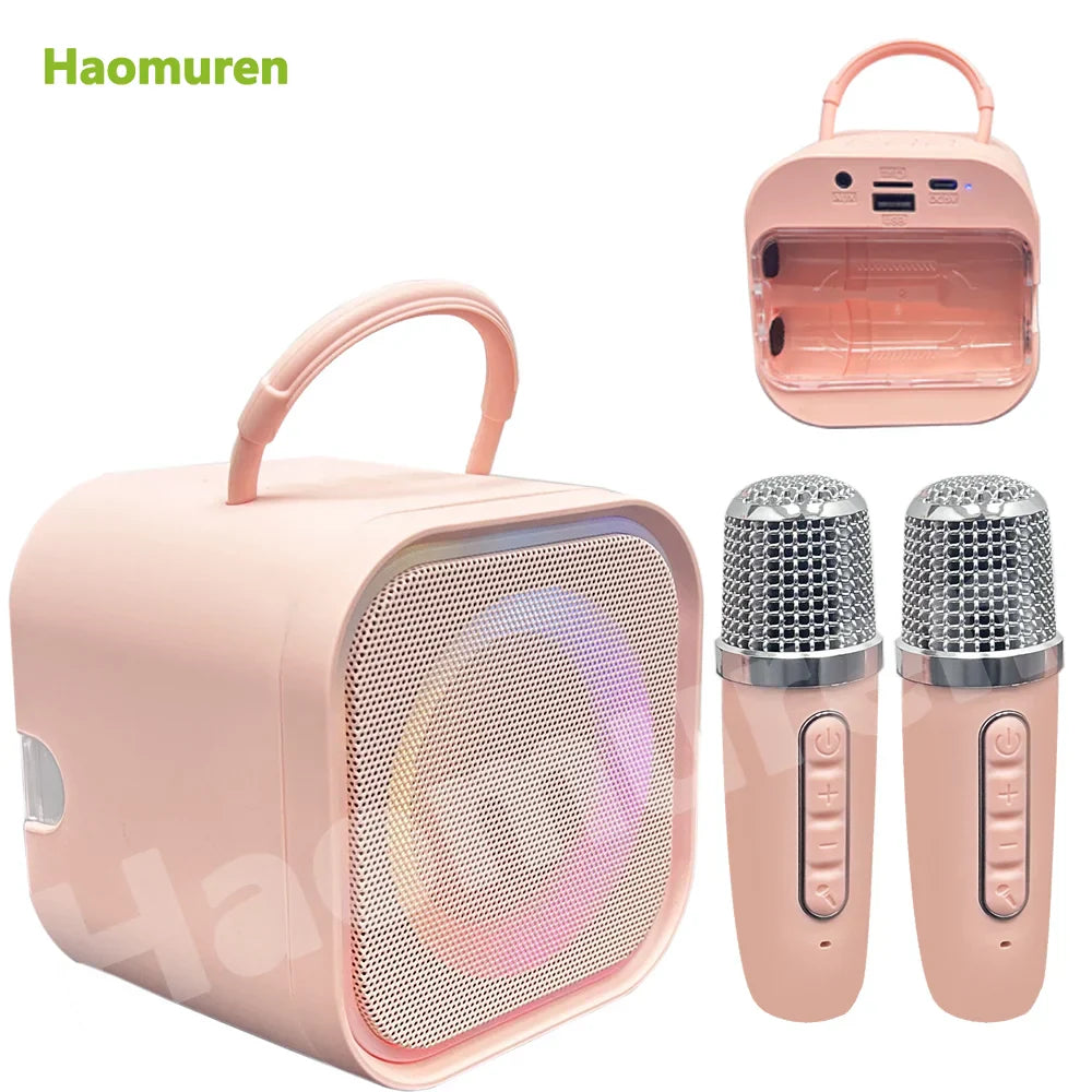Pink haomuren mini karaoke machine with handle and two pink microphones silver mesh grille bluetooth karaoke speaker for home party toys