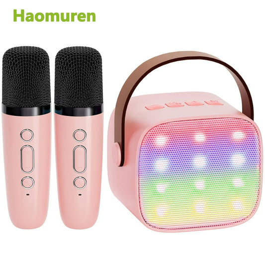 Haomuren mini karaoke machine in pink with wireless microphones and rainbow led pa speaker for family singing gift
