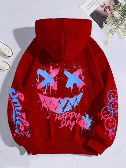 Red hoodie street hip with vibrant blue and pink happy day graffiti smiley face design on the back and crewneck style