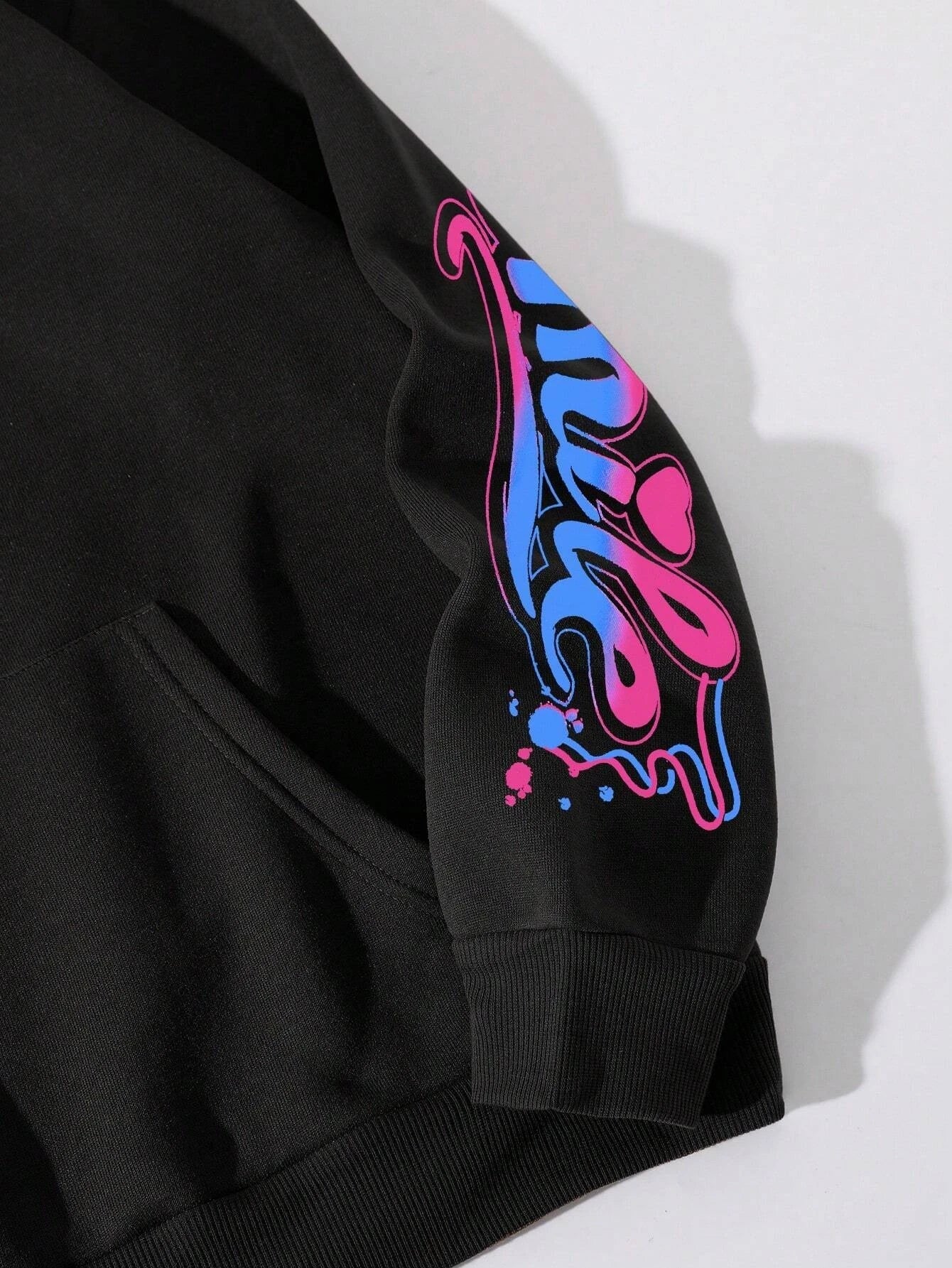 Black hoodie featuring a vibrant pink and blue gradient happy day graffiti print with heart sleeve accents in hoodie street hip style