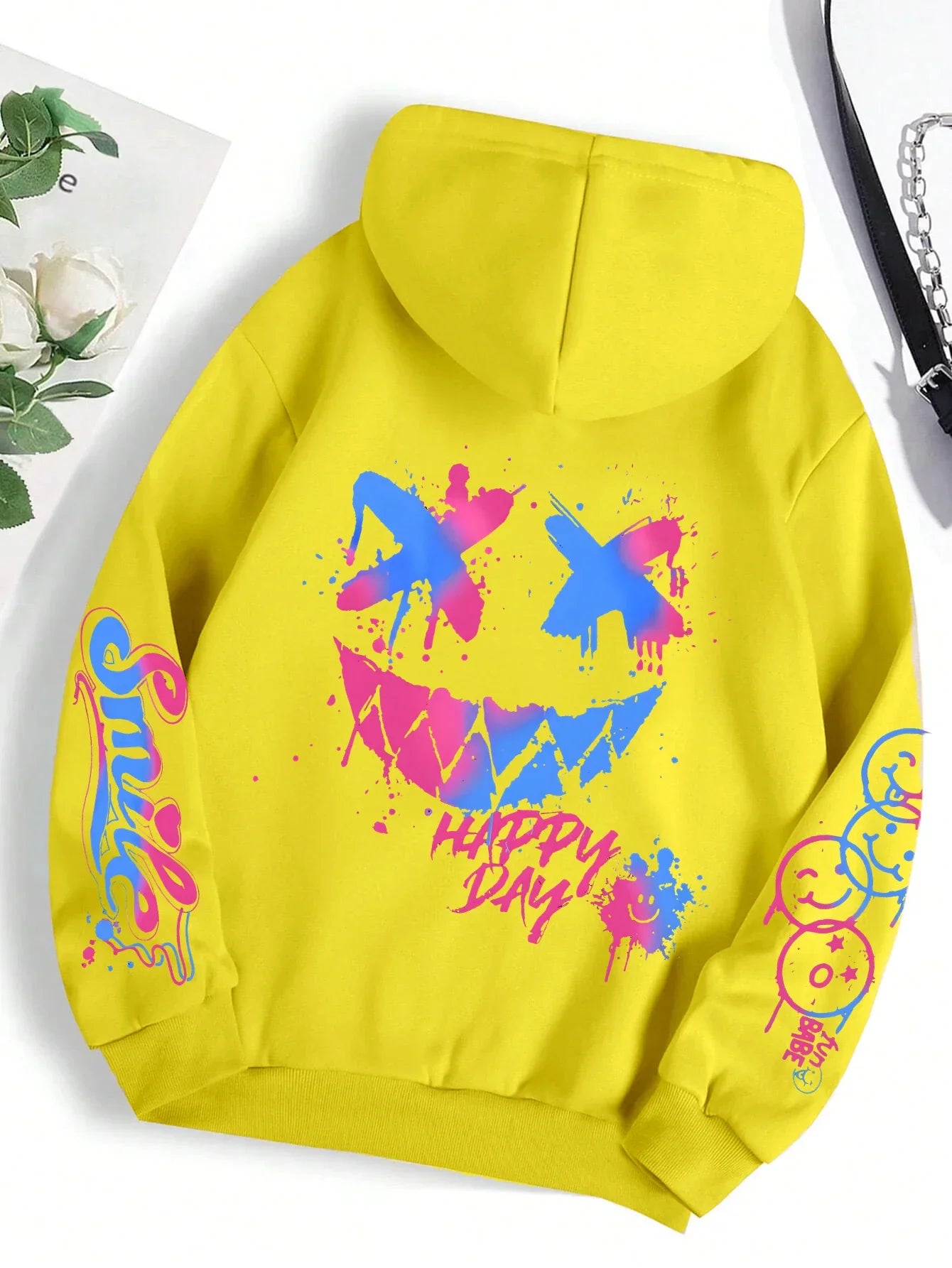 Bright yellow happy day graffiti hoodie street hip featuring vibrant graffiti smiley face and hoody fashion crewneck design