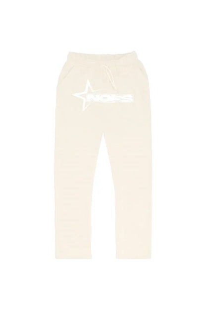 Cream-colored baggy sweatpants with white star and text graphic on left thigh from harajuku hoodies men suits