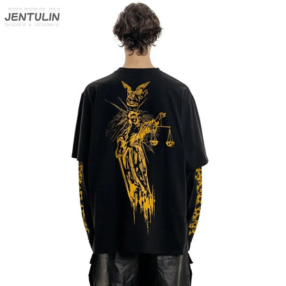 Black jentulin oversized t-shirt with bold gold lady justice graphic and gold leopard-print sleeve cuffs for streetwear