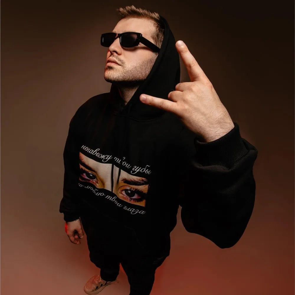 Black hoodie harajuku oversized streetwear with eyes graphic print and white text hip hop aesthetic goth y2k winter pullover