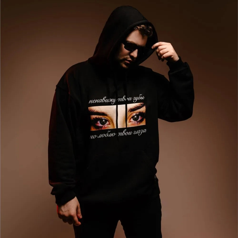 Black harajuku oversized hoodie with eye graphic and white cyrillic text ideal for hip hop streetwear use